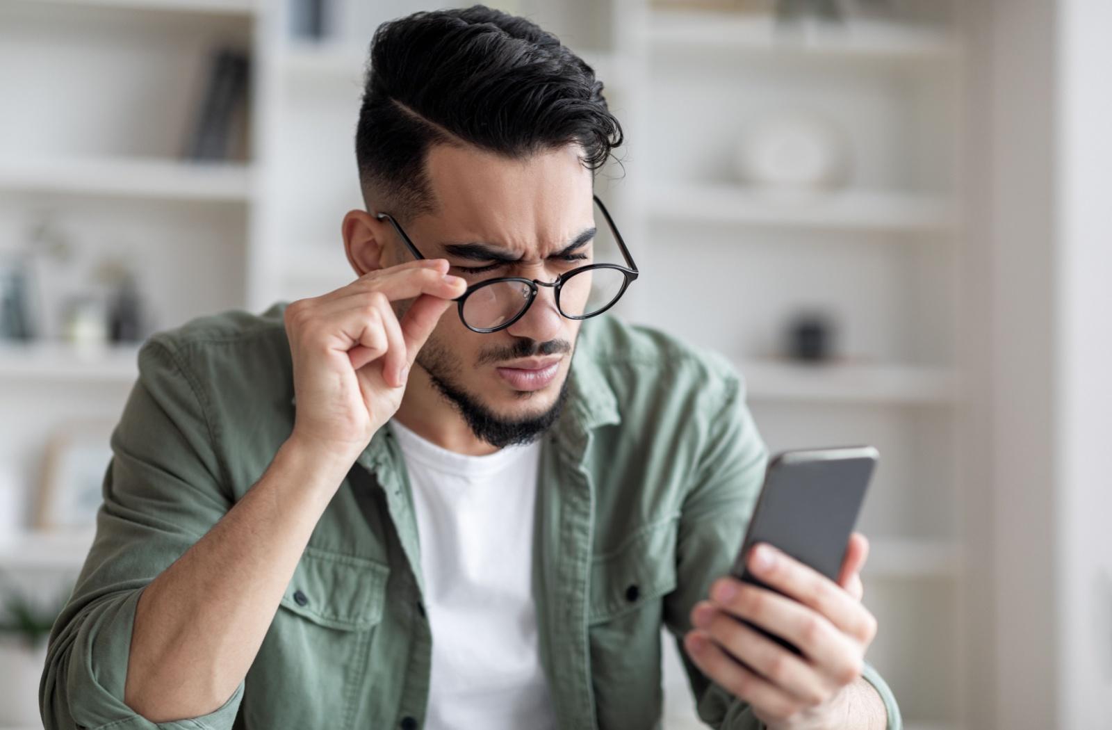 person experiencing blurred vision from digital eye strain